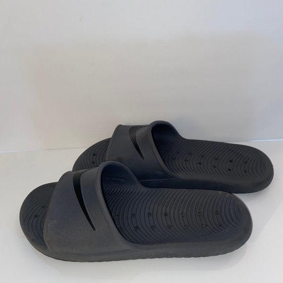 grey and black nike slides